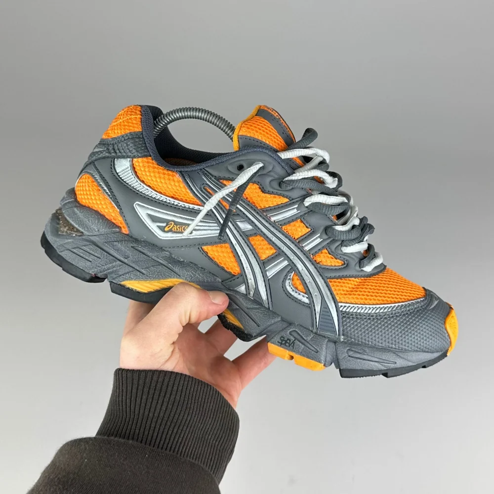 GEL Nimbus 16 — Gris / Orange