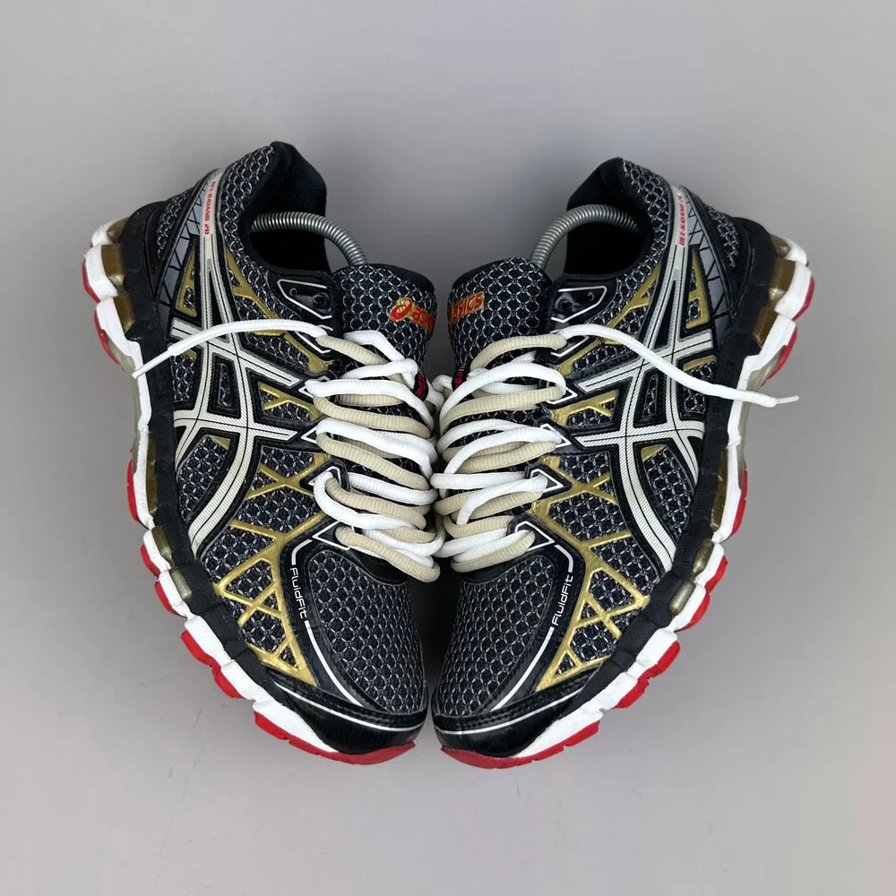 GEL Nimbus 16 — Noir / Or
