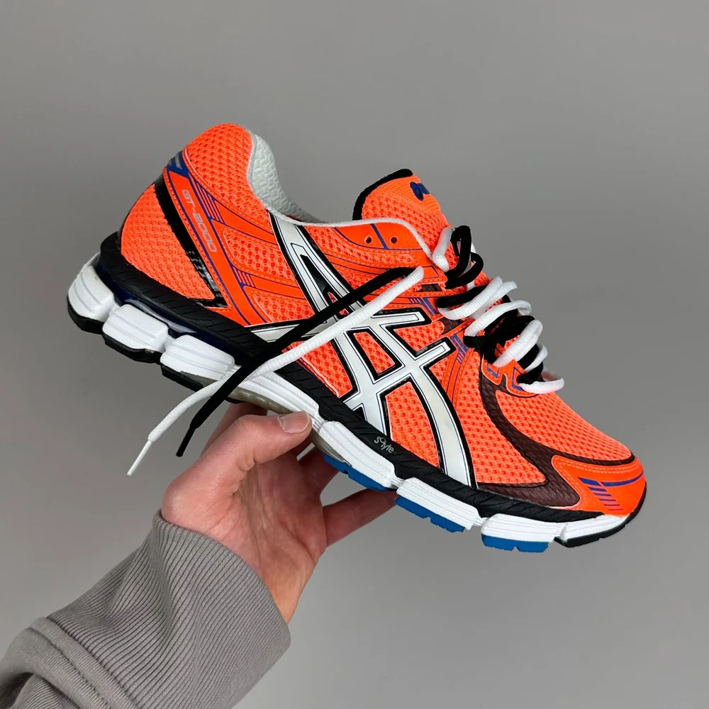 GEL Nimbus 16 — Orange / Blanc